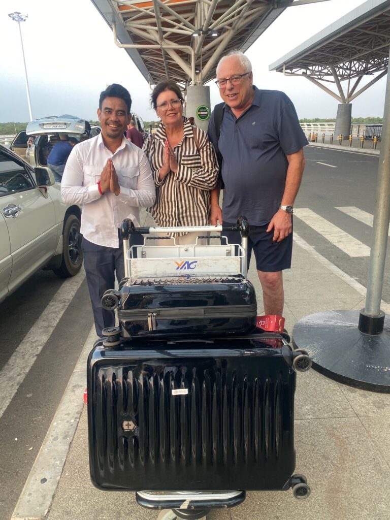 Siem Reap Airport Transfer Driver WIth Guests at SAI Airport