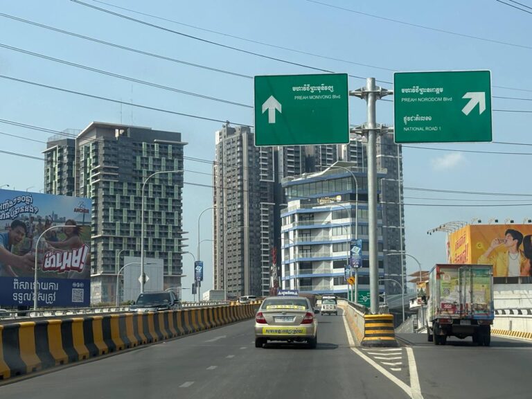 Driving into Phnom Penh city from KTI airport showing main highway route used for private airport transfers