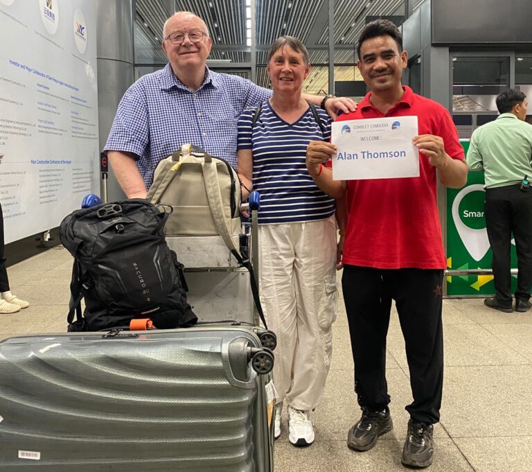 Siem Reap Airport Transfers driver with guests at SAI Arrivals area
